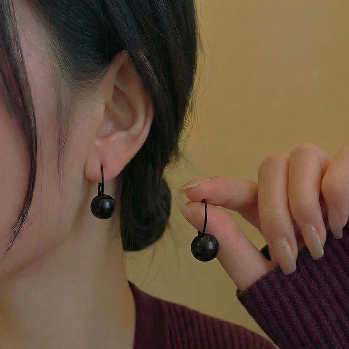 aretes negros 1